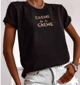 Elevate your style with our CRÈME DE LA CRÈME slogan t-shirt in bold black. Stand out from the crowd and make a statement with this chic and trendy tee. Perfect for any occasion, this shirt is sure to turn heads and showcase your impeccable taste. Add a touch of luxury to your wardrobe with the CRÈME DE LA CRÈME slogan t-shirt. Get yours today!