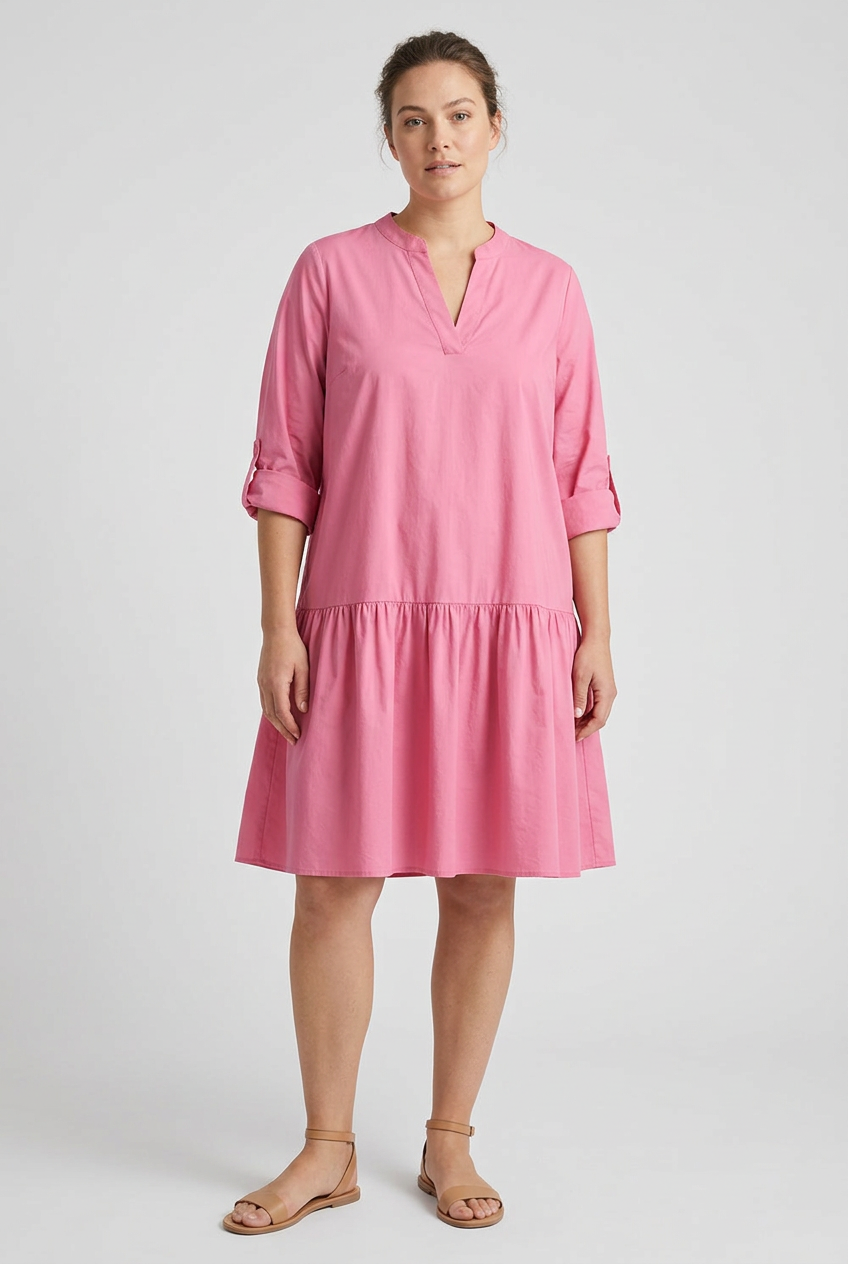 Model wearing a pink relaxed-fit casual dress